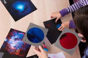 A photo showing blue and red color filters being used with astronomical images and created images.