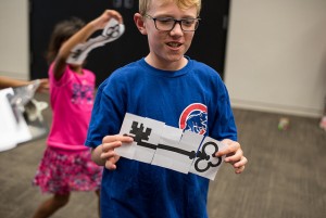 A participant with his family's finished key.