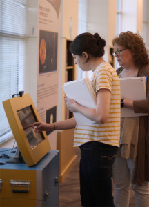 Participants interacting with exhibit