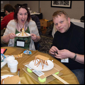 Kelsey Skrobis (left) of Anchorage Public Library and Tor Anderzen (right), a member of the Mat‐Su Branch of the American Society of Civil Engineers, team up for some fun STEAM learning!